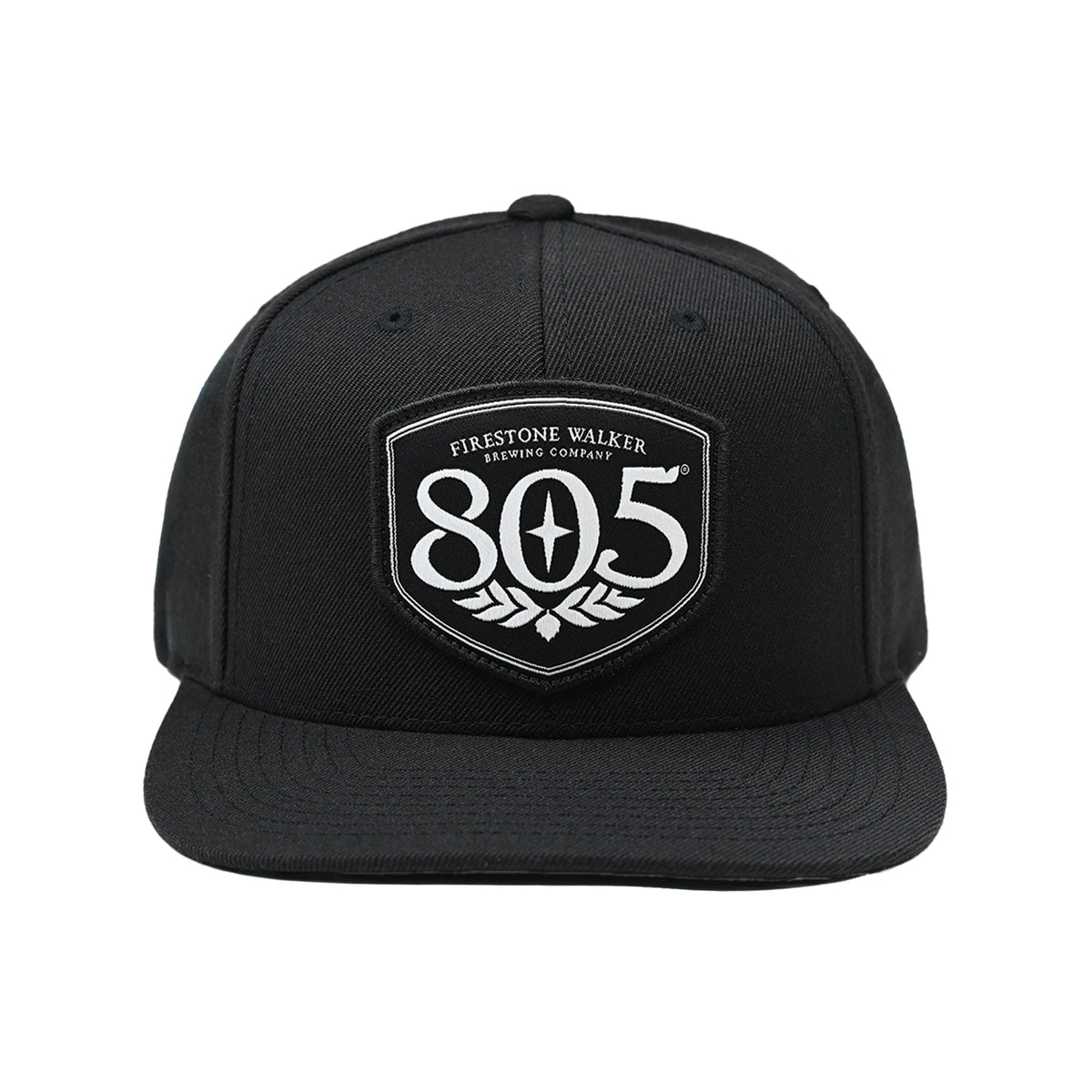 Firestone Walker 805 snapback hat, black with shield logo patch, front view