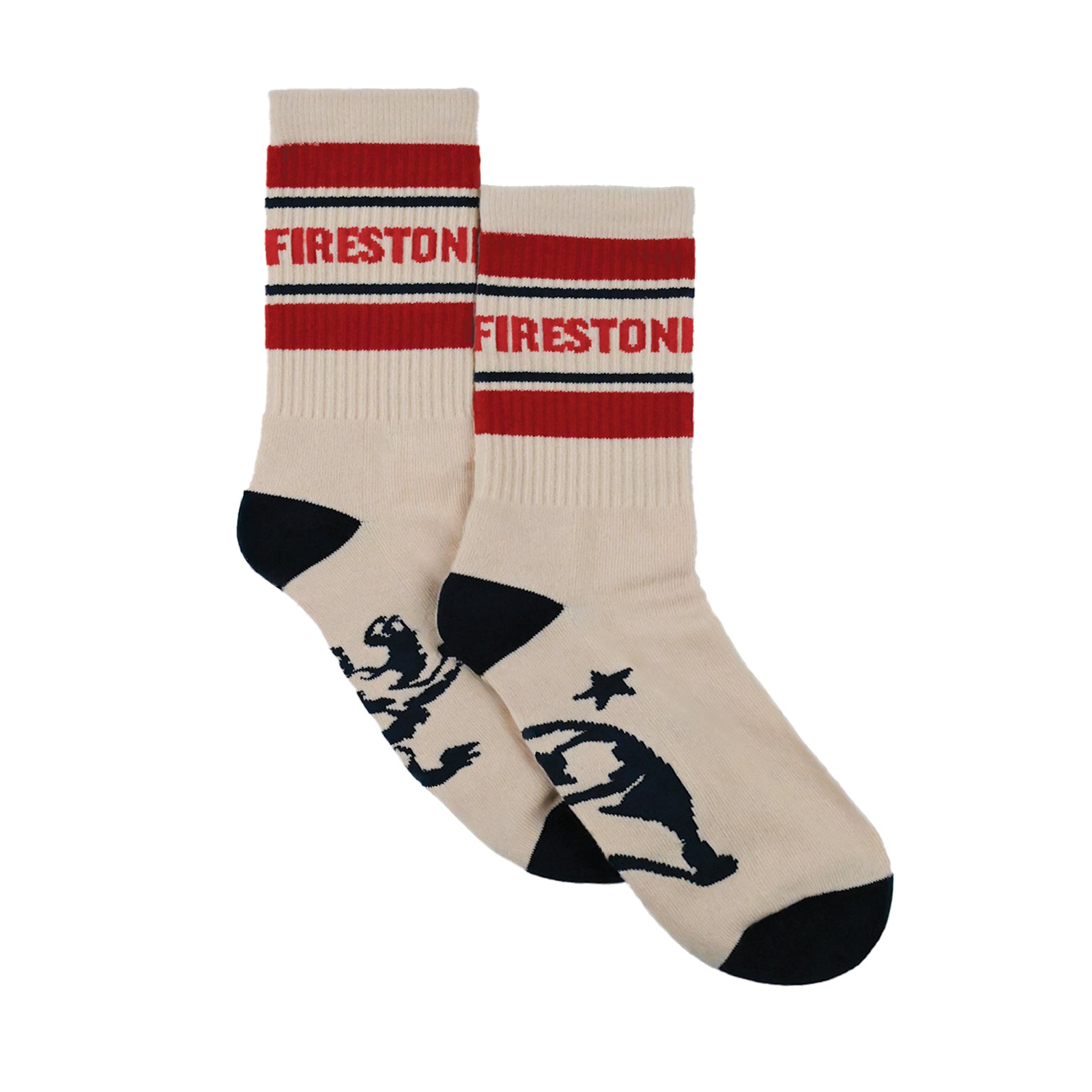 Firestone Walker "That 70's Socks," pair shown unpackaged — cream crew socks with red stripes, "Firestone" text, navy toe and heel. One sole shows a California bear graphic, the other a lion.
