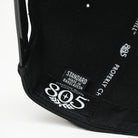 Interior close-up of 805 hat showing brand label and "Properly Chill" lining print, black