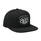 Firestone Walker 805 snapback hat, black with shield logo patch, angled right view